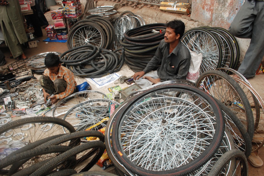 Bicycle Mechanic and Parts Trader a the Gujari Bazaar Bicycle Mechanic and Parts Trader a the Gujari Bazaar